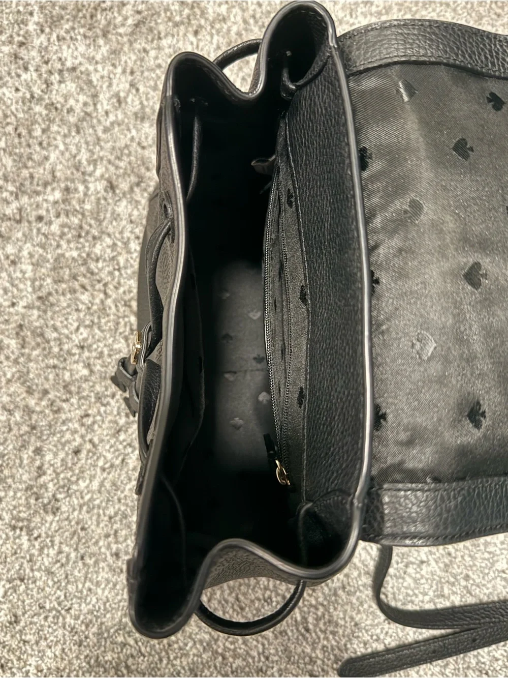 Kate Spade New York Black Pebbled Leather Flap Backpack